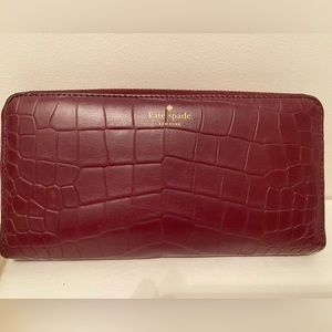 Burgundy Kate Spade zip around wallet